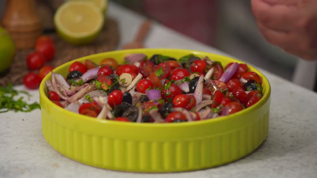 طاجن سمك بالخضراوات والزيتون